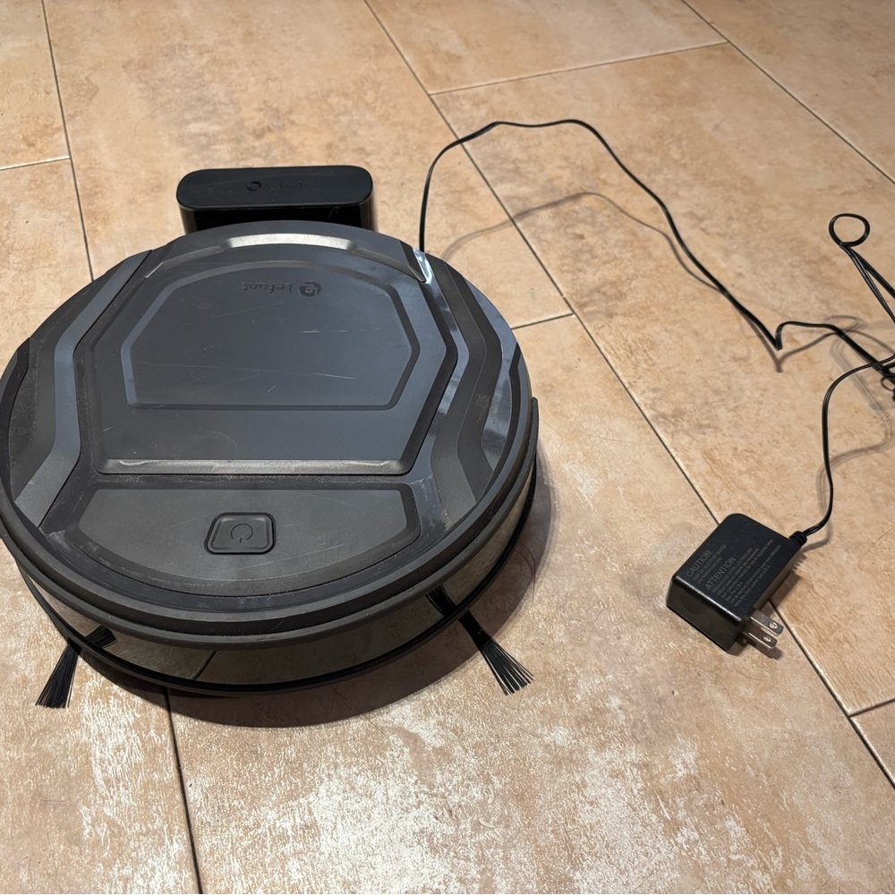 Black Robotic Vacuum Cleaner